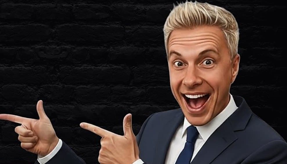 Gary Vaughan grinning and pointing